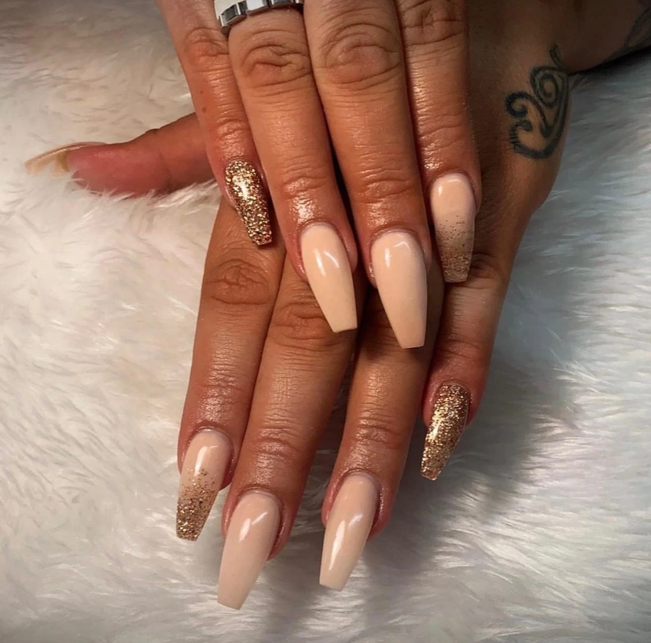 Nude coffin acrylic nails with gold glitter accent nails by Nailed by Ellie